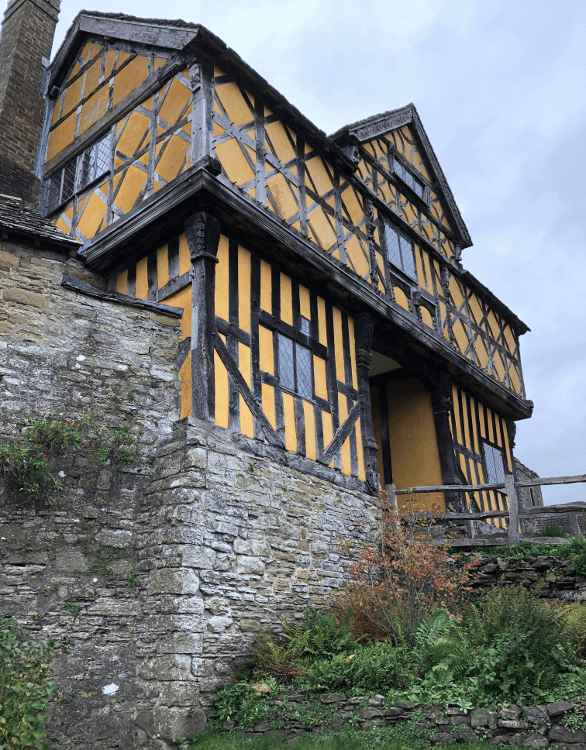Stokesay Castle, a yellow, timbered manor house